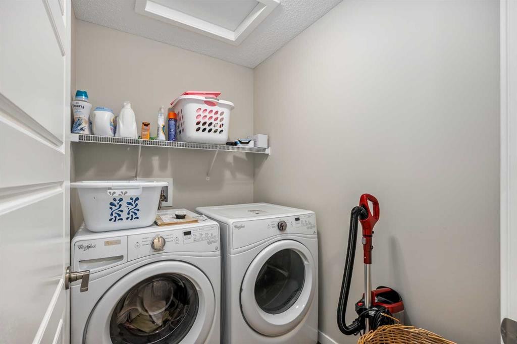 265 Seton Circle Se, Calgary, AB - Indoor Photo Showing Laundry Room
