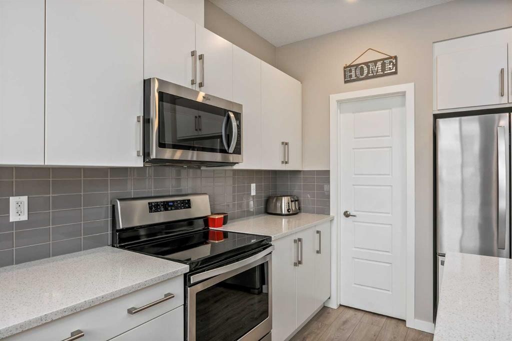 265 Seton Circle Se, Calgary, AB - Indoor Photo Showing Kitchen With Stainless Steel Kitchen With Upgraded Kitchen