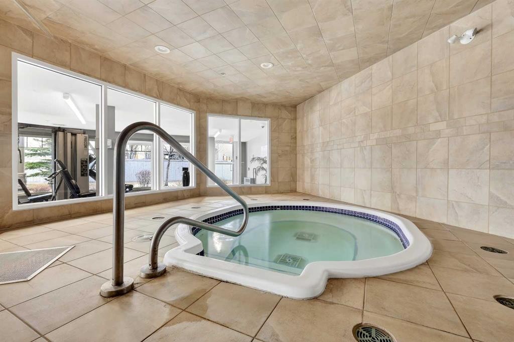 137-52 Cranfield Link Se, Calgary, AB - Indoor Photo Showing Other Room With In Ground Pool
