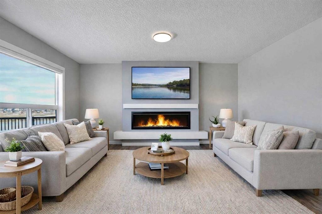 47 Corner Meadows Row Ne, Calgary, AB - Indoor Photo Showing Living Room With Fireplace