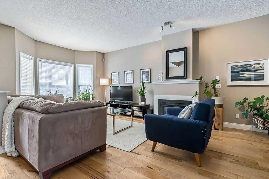 119 Citadel Lane Nw, Calgary, AB - Indoor Photo Showing Living Room With Fireplace
