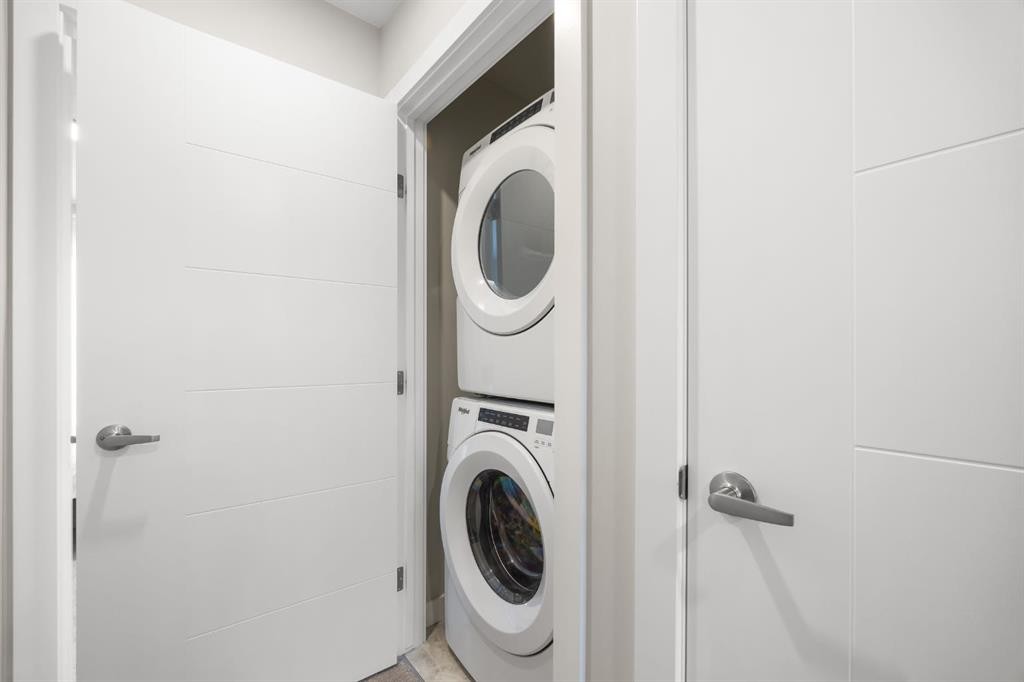 306 Evanscrest Square Nw, Calgary, AB - Indoor Photo Showing Laundry Room