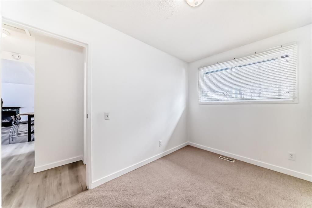 1277 Lake Sylvan Drive Se, Calgary, AB - Indoor Photo Showing Other Room