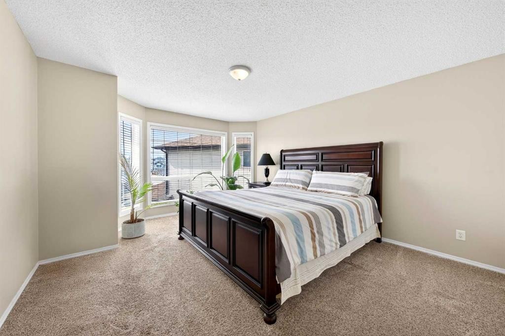 238 Royal Birch View Nw, Calgary, AB - Indoor Photo Showing Bedroom