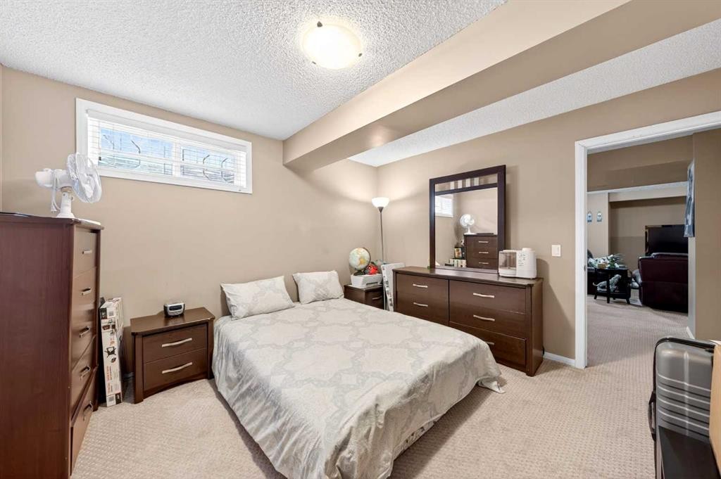 238 Royal Birch View Nw, Calgary, AB - Indoor Photo Showing Bedroom