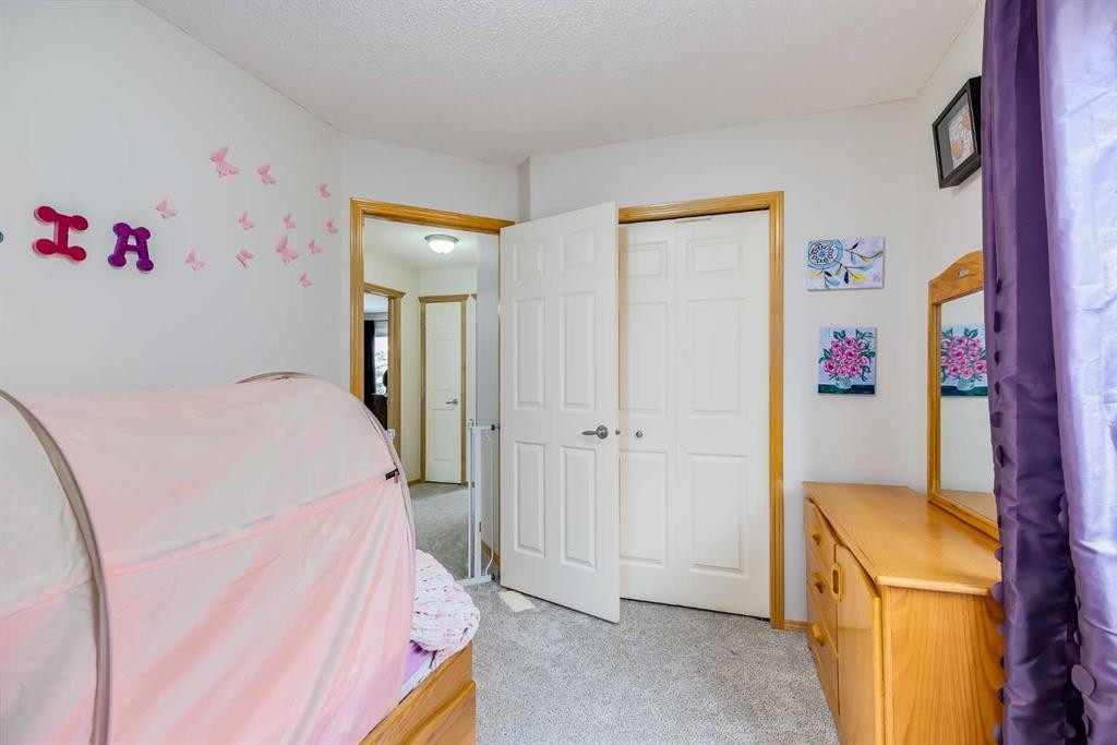 96 Chapala Square Se, Calgary, AB - Indoor Photo Showing Bedroom
