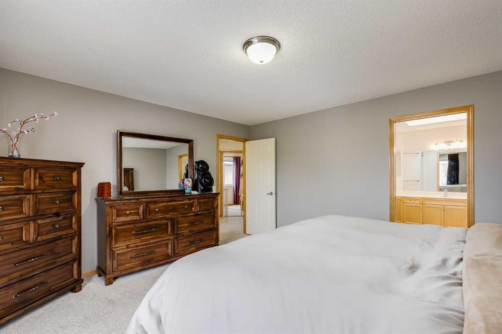 96 Chapala Square Se, Calgary, AB - Indoor Photo Showing Bedroom