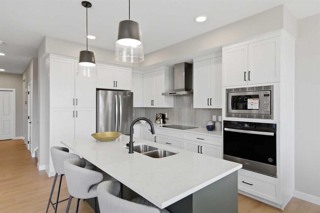 147 Belvedere Crescent Se, Calgary, AB - Indoor Photo Showing Kitchen With Double Sink With Upgraded Kitchen
