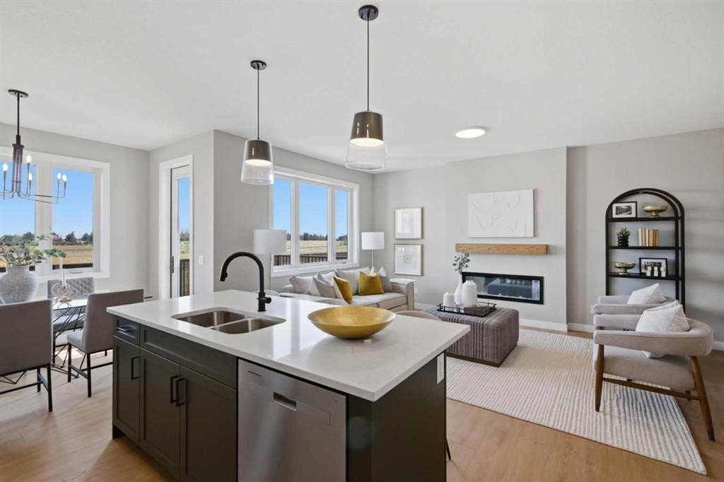 147 Belvedere Crescent Se, Calgary, AB - Indoor Photo Showing Kitchen With Fireplace With Double Sink With Upgraded Kitchen