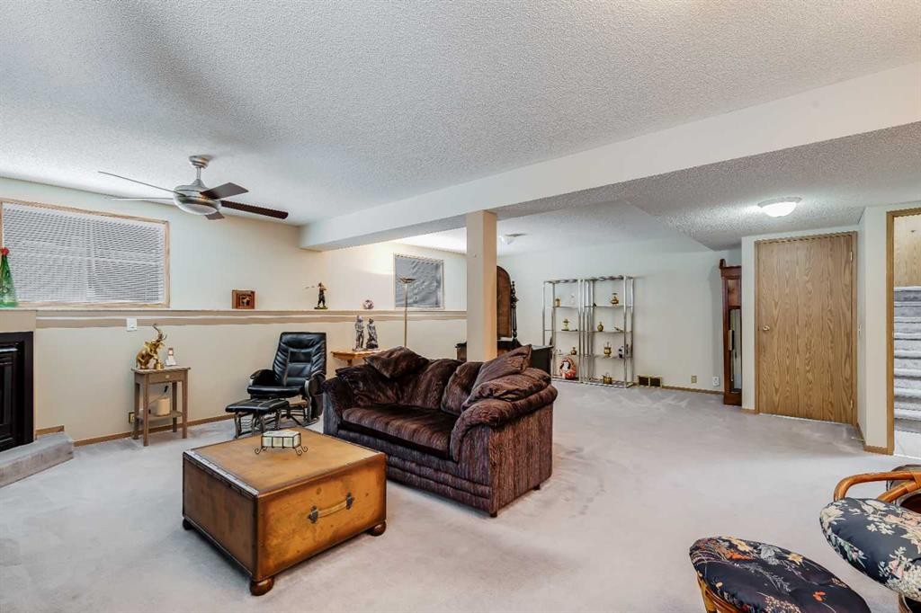 374 Martindale Boulevard Ne, Calgary, AB - Indoor Photo Showing Living Room