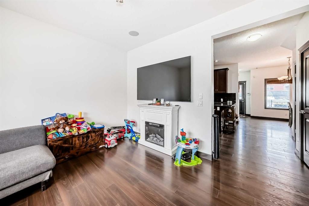 17 Redstone Common Ne, Calgary, AB - Indoor Photo Showing Living Room With Fireplace