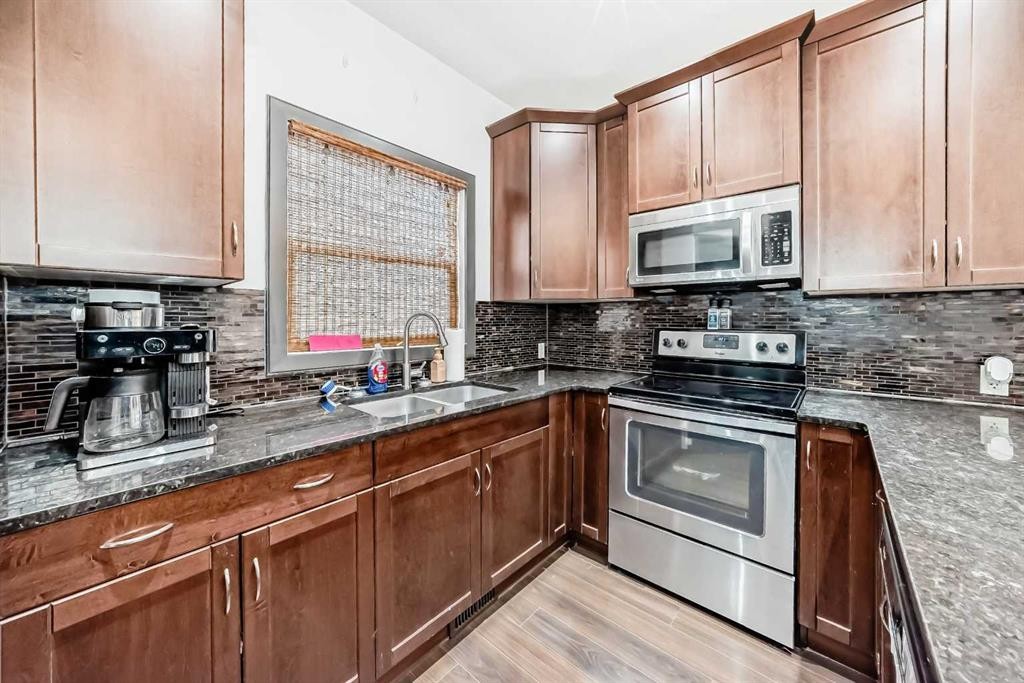 17 Redstone Common Ne, Calgary, AB - Indoor Photo Showing Kitchen With Double Sink