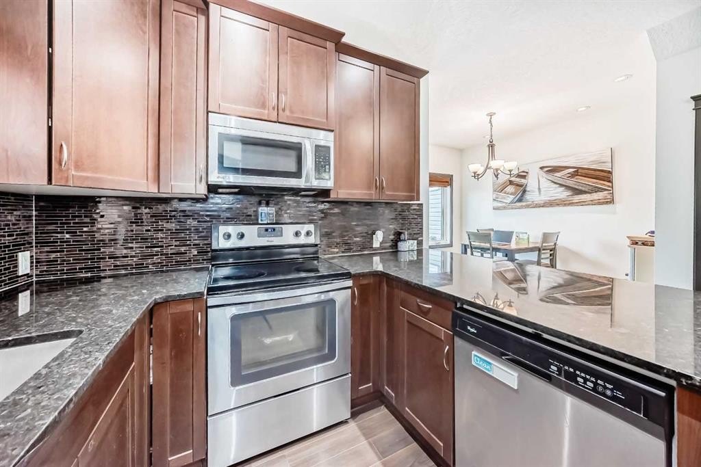17 Redstone Common Ne, Calgary, AB - Indoor Photo Showing Kitchen With Stainless Steel Kitchen With Upgraded Kitchen