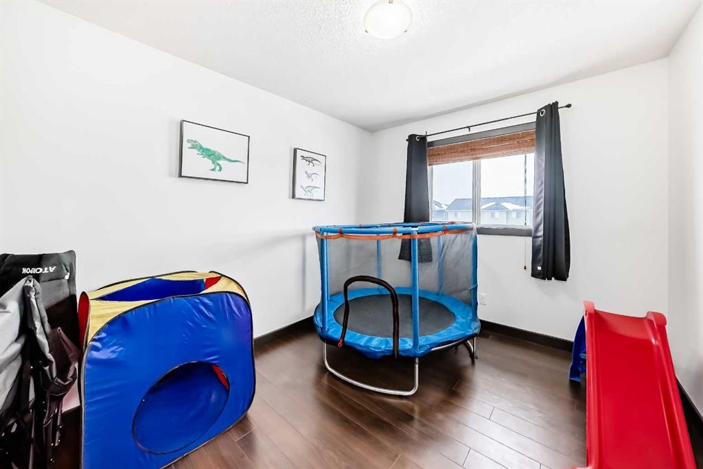 17 Redstone Common Ne, Calgary, AB - Indoor Photo Showing Other Room