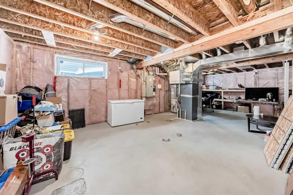 17 Redstone Common Ne, Calgary, AB - Indoor Photo Showing Basement