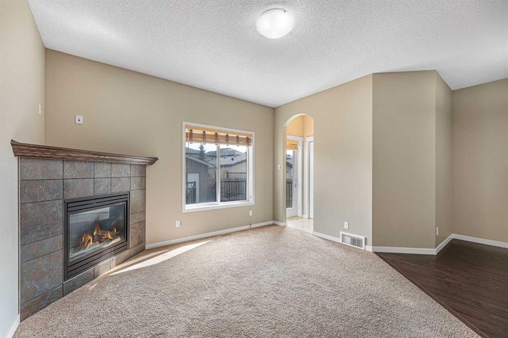 46 Autumn Crescent Se, Calgary, AB - Indoor With Fireplace