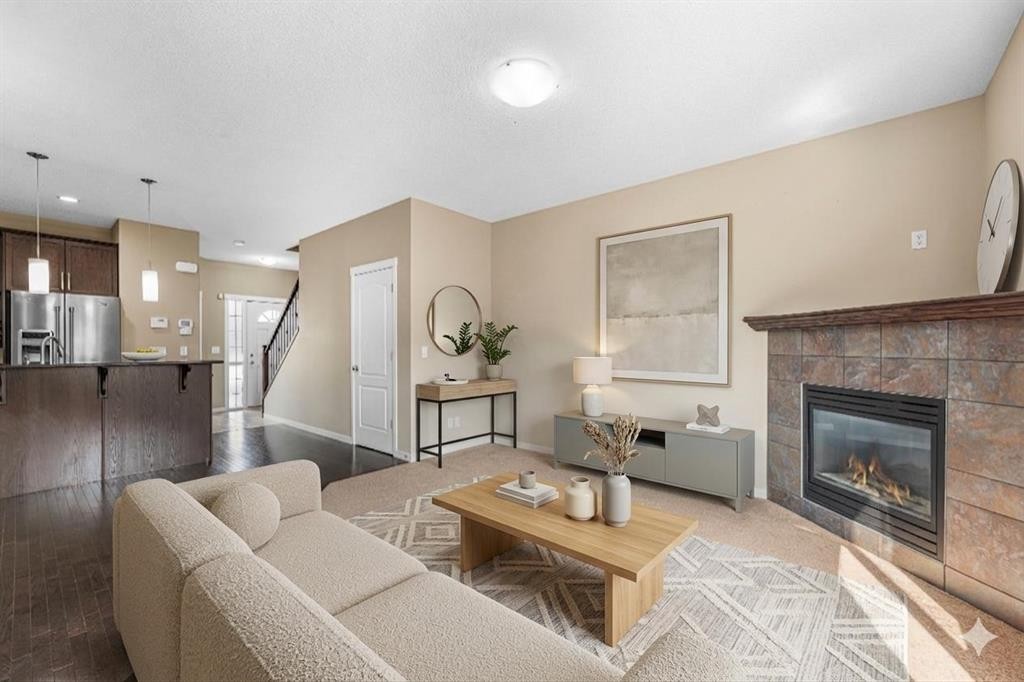 46 Autumn Crescent Se, Calgary, AB - Indoor Photo Showing Living Room With Fireplace
