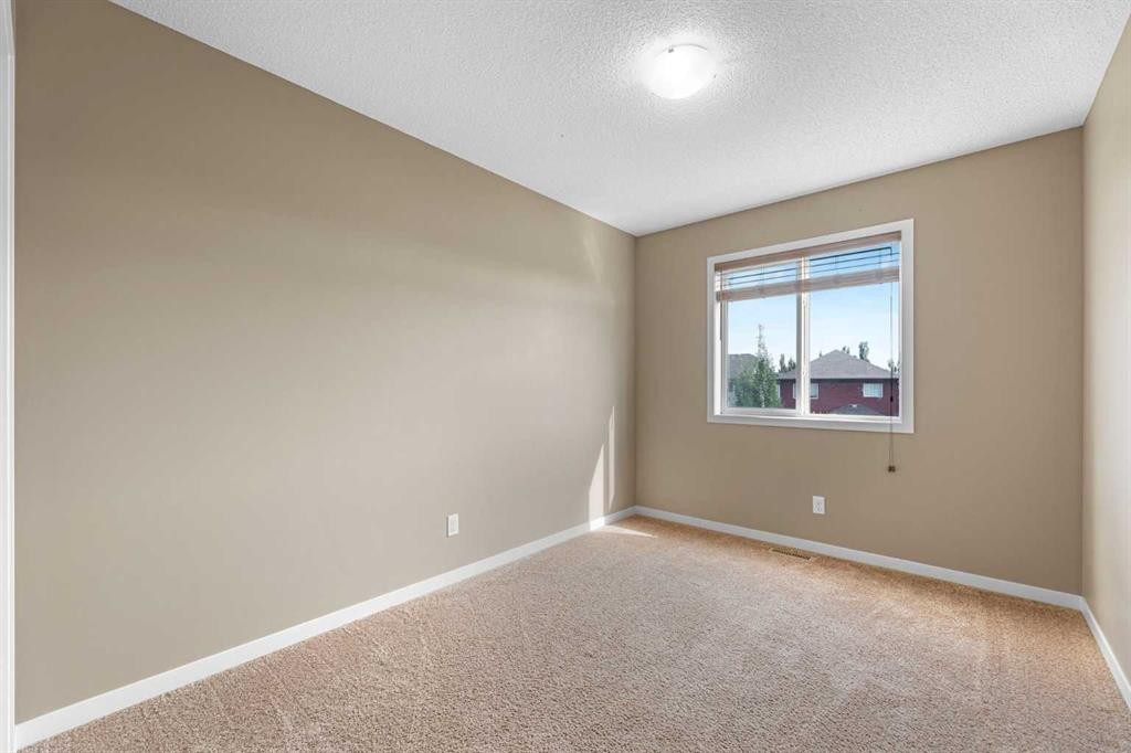 46 Autumn Crescent Se, Calgary, AB - Indoor Photo Showing Other Room