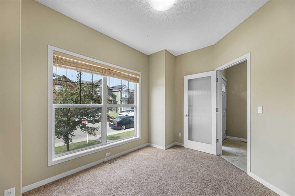 46 Autumn Crescent Se, Calgary, AB - Indoor Photo Showing Other Room