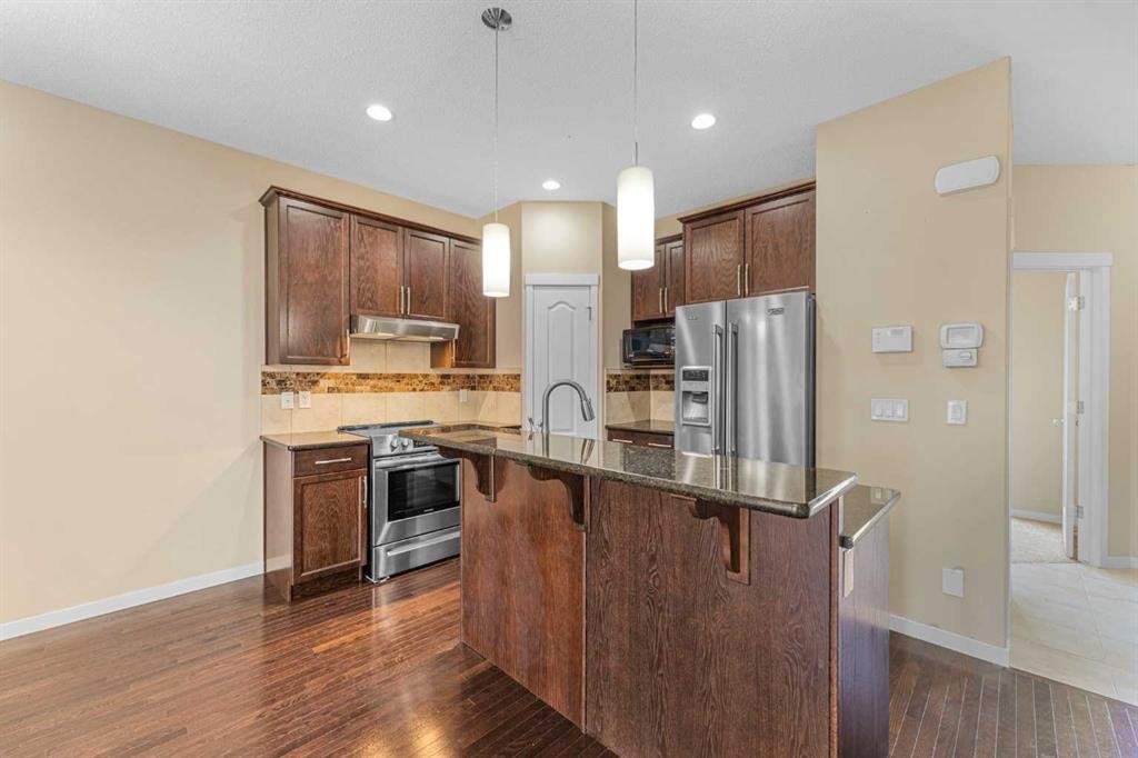 46 Autumn Crescent Se, Calgary, AB - Indoor Photo Showing Kitchen With Stainless Steel Kitchen With Upgraded Kitchen