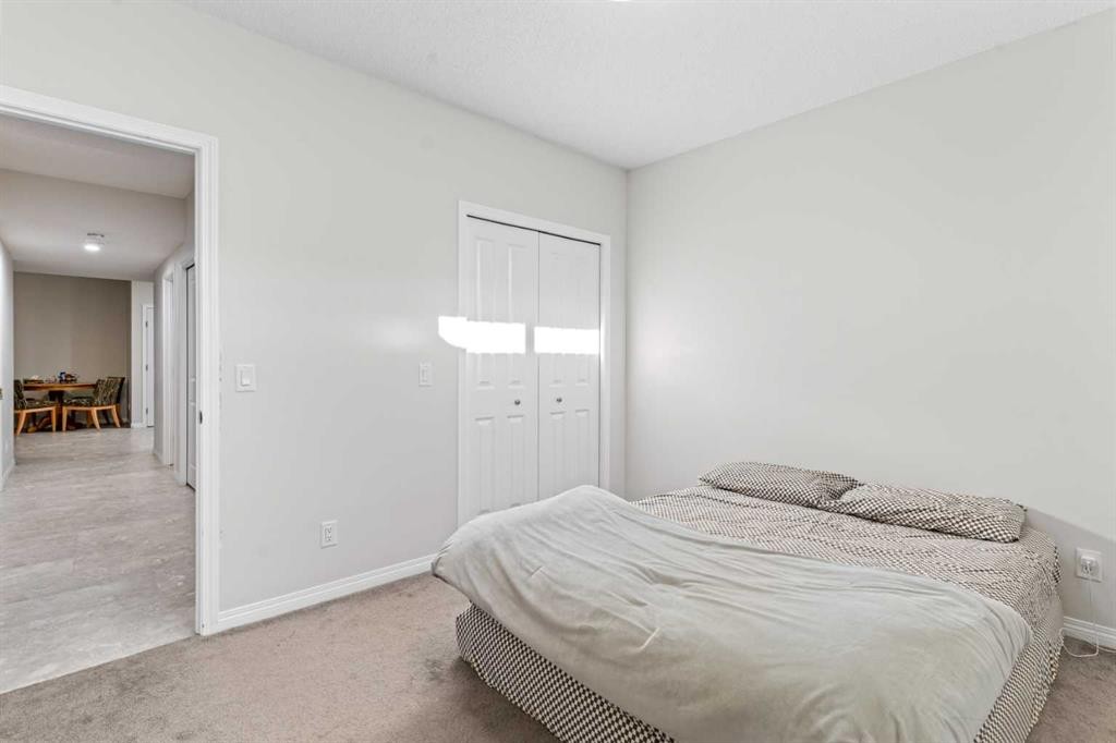 437 Corner Meadows Way Ne, Calgary, AB - Indoor Photo Showing Bedroom