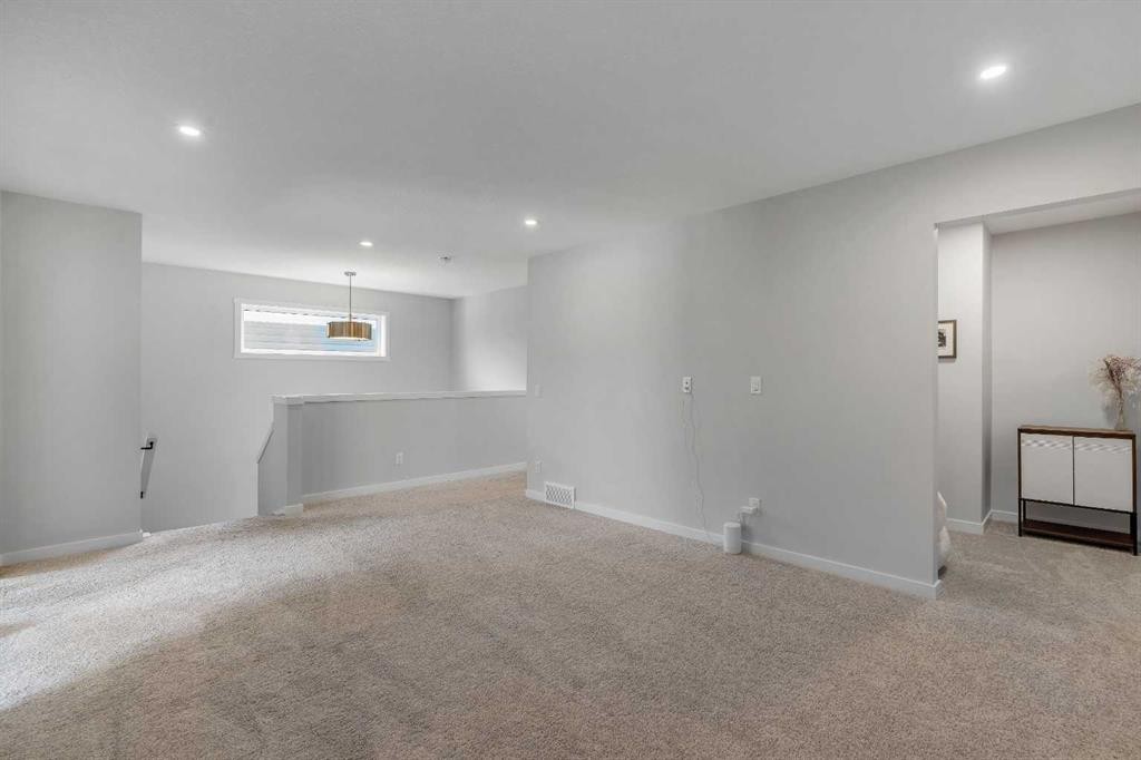 23 Savoy Terrace Se, Calgary, AB - Indoor Photo Showing Other Room