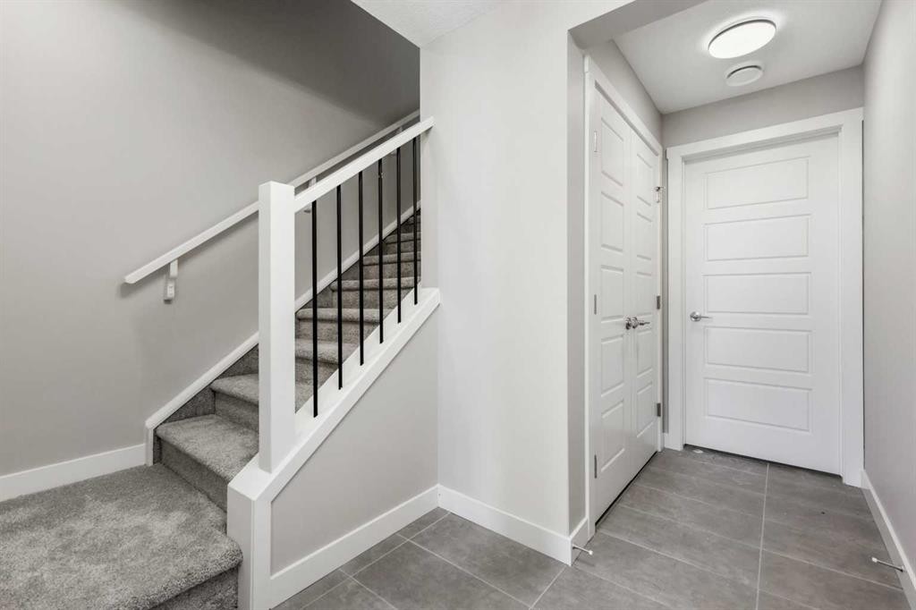 8 Waterford Glen, Chestermere, AB - Indoor Photo Showing Other Room