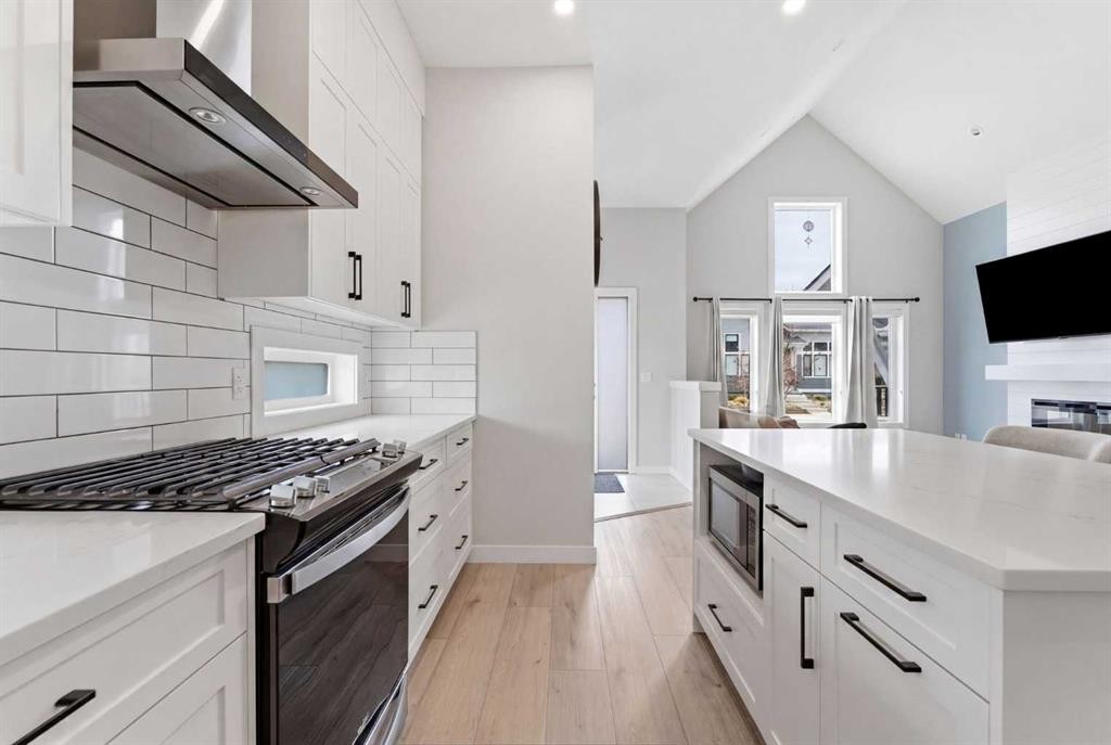 56 Iris Crescent, Okotoks, AB - Indoor Photo Showing Kitchen With Upgraded Kitchen