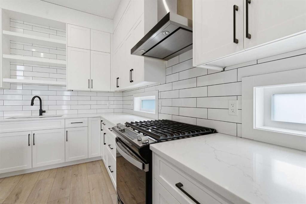 56 Iris Crescent, Okotoks, AB - Indoor Photo Showing Kitchen With Upgraded Kitchen