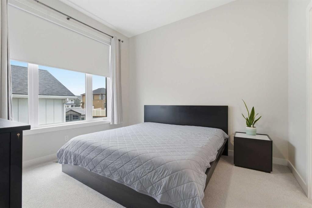56 Iris Crescent, Okotoks, AB - Indoor Photo Showing Bedroom
