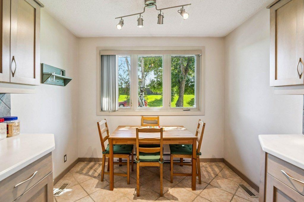 153 Mckinnon Crescent Ne, Calgary, AB - Indoor Photo Showing Dining Room