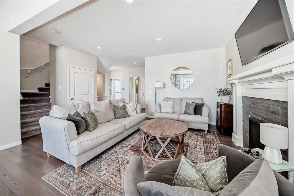 35 Walden Mount Se, Calgary, AB - Indoor Photo Showing Living Room With Fireplace