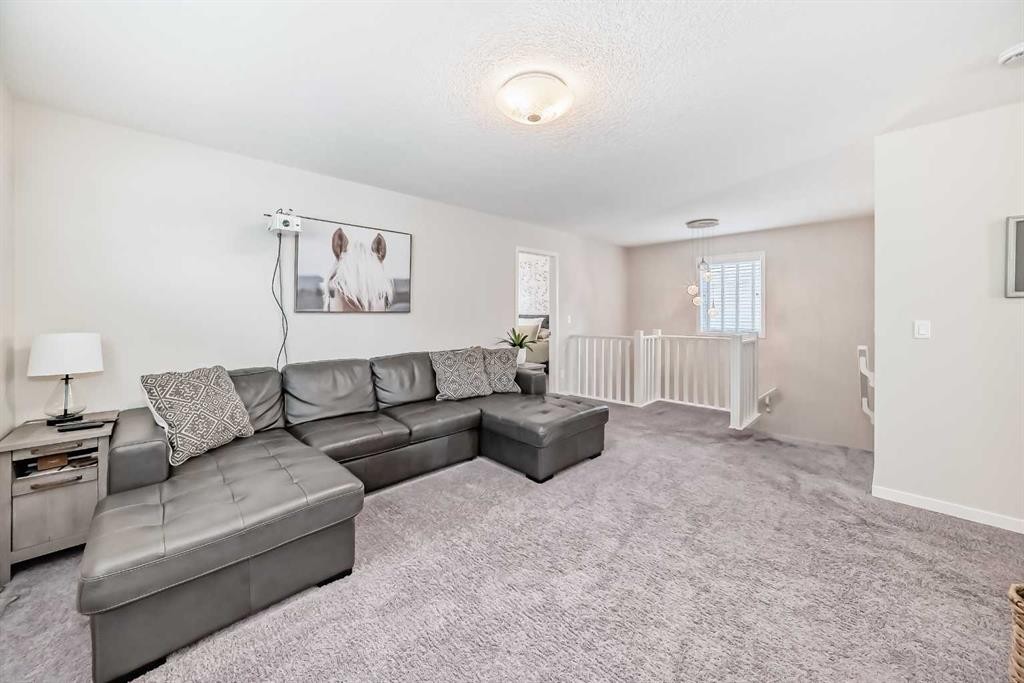 35 Walden Mount Se, Calgary, AB - Indoor Photo Showing Living Room