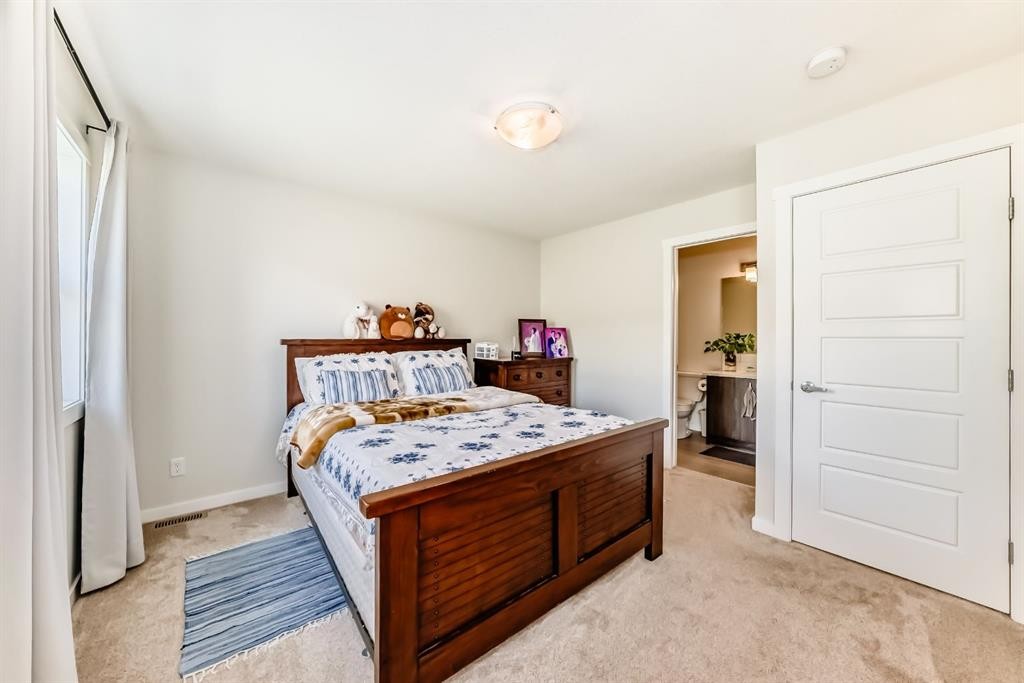 206 Cranbrook Square Se, Calgary, AB - Indoor Photo Showing Bedroom