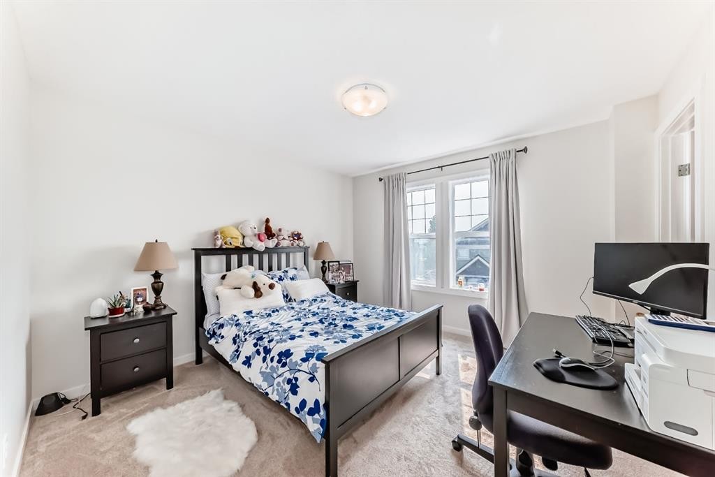 206 Cranbrook Square Se, Calgary, AB - Indoor Photo Showing Bedroom