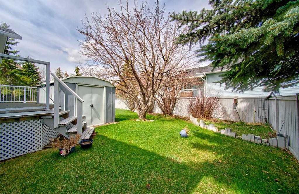 273 Woodside Road Nw, Airdrie, AB - Outdoor With Deck Patio Veranda