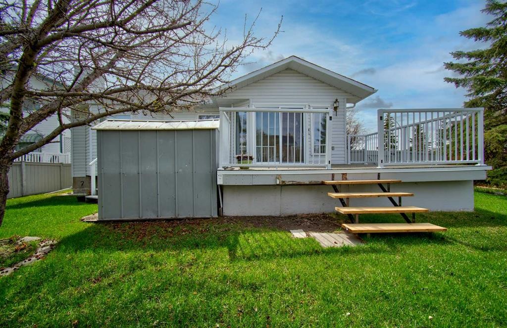 273 Woodside Road Nw, Airdrie, AB - Outdoor With Deck Patio Veranda