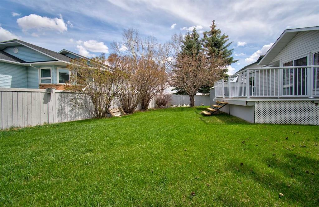 273 Woodside Road Nw, Airdrie, AB - Outdoor With Deck Patio Veranda