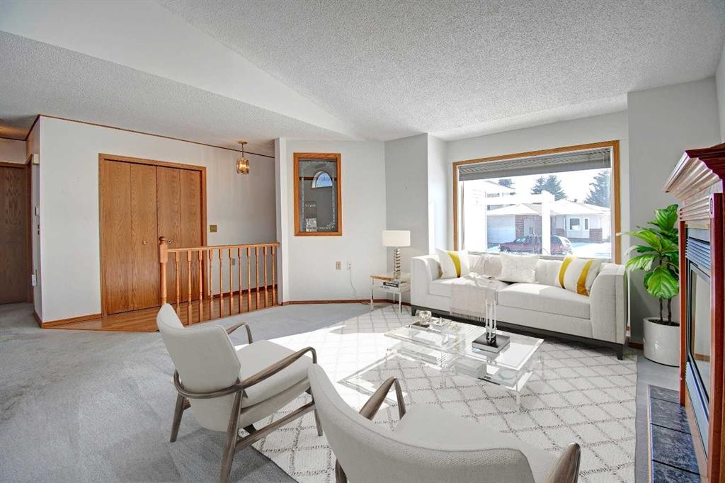 273 Woodside Road Nw, Airdrie, AB - Indoor Photo Showing Living Room