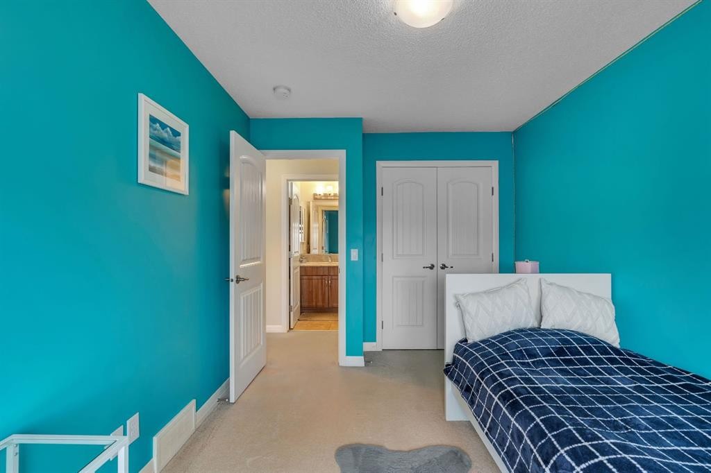 77 Red Sky Way Ne, Calgary, AB - Indoor Photo Showing Bedroom