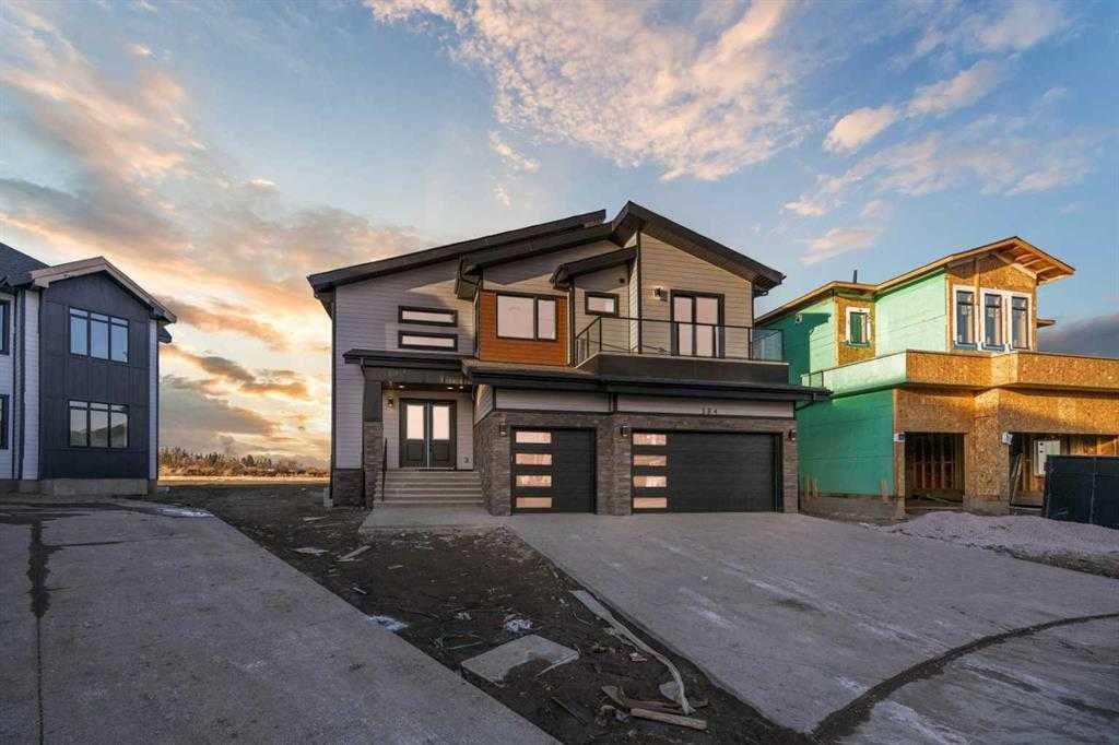 384 Watercrest Place, Chestermere, AB - Outdoor With Facade