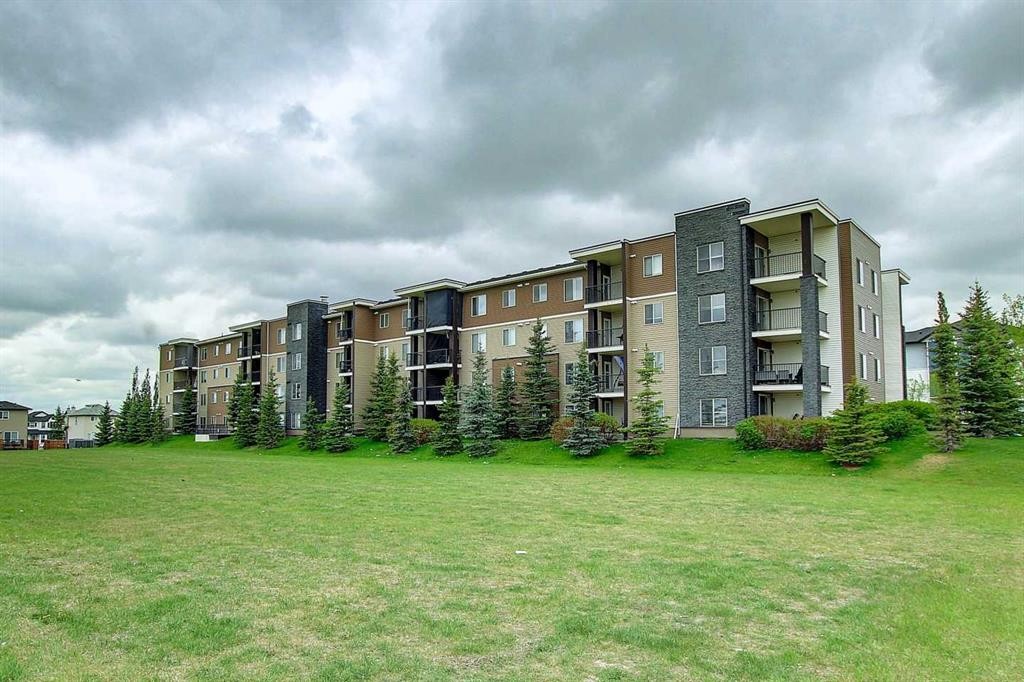 301-355 Taralake Way Ne, Calgary, AB - Outdoor With Balcony With Facade