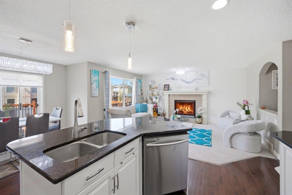87 Kincora Drive Nw, Calgary, AB - Indoor Photo Showing Other Room With Fireplace