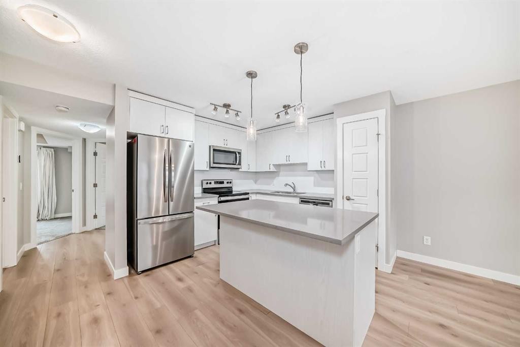 647 Cranbrook Walk Se, Calgary, AB - Indoor Photo Showing Kitchen With Stainless Steel Kitchen