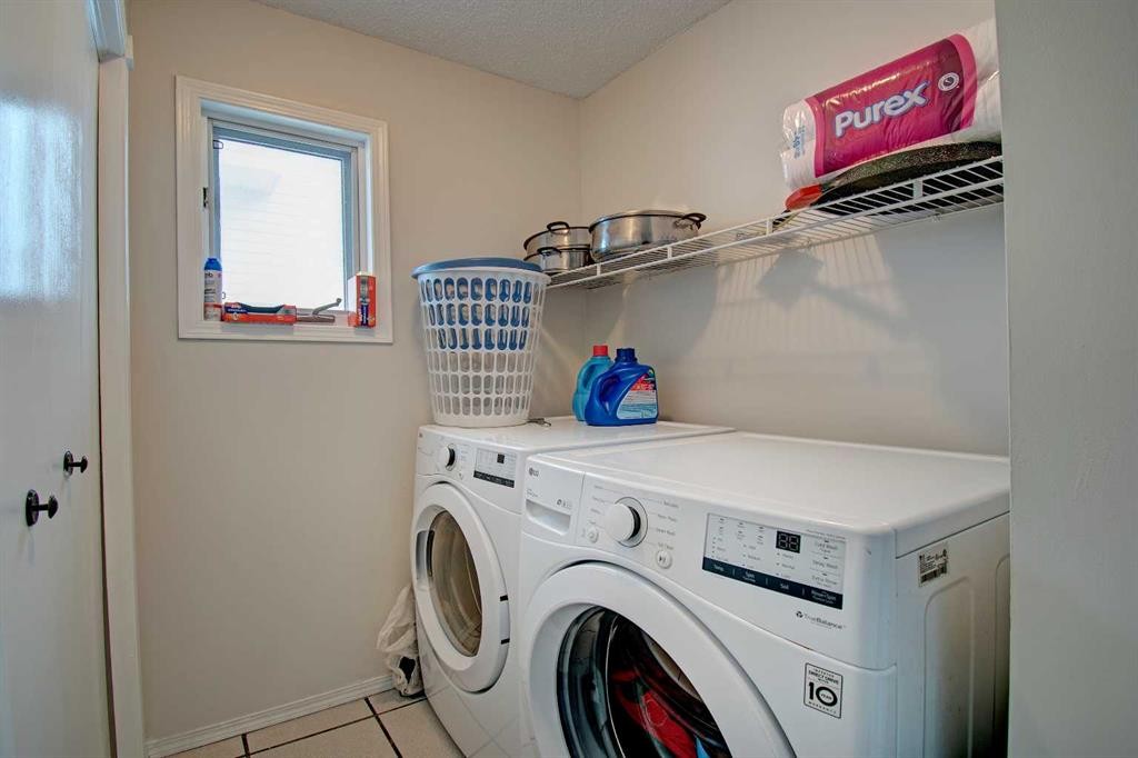 10316 Hidden Valley Drive Nw, Calgary, AB - Indoor Photo Showing Laundry Room