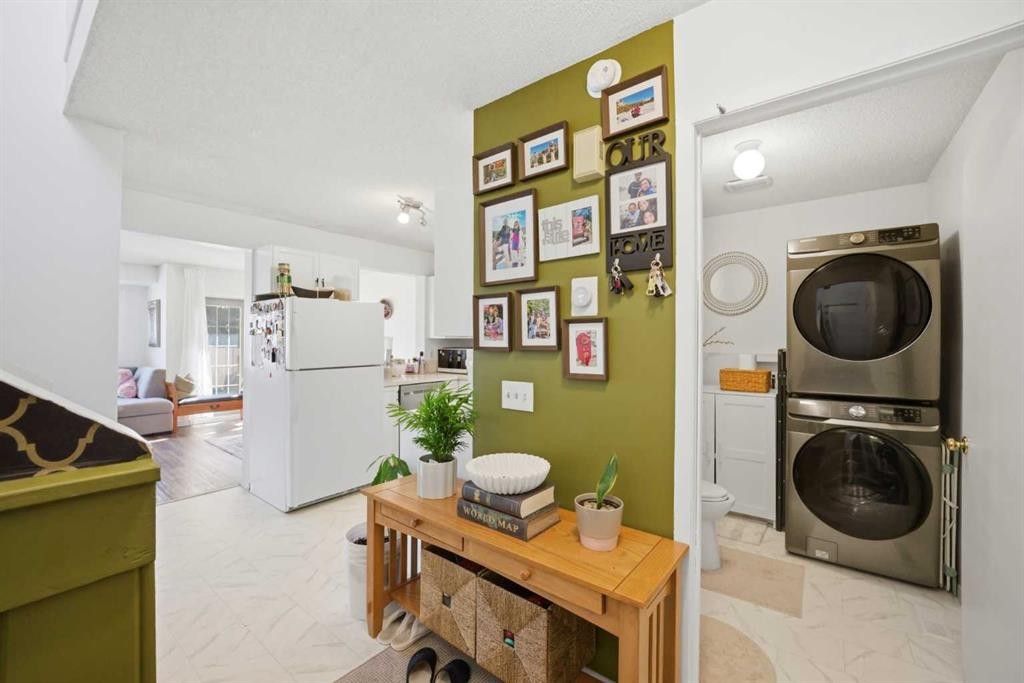 80 Martinglen Way Ne, Calgary, AB - Indoor Photo Showing Laundry Room