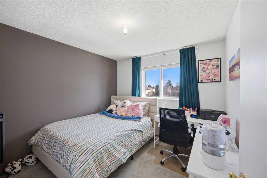 80 Martinglen Way Ne, Calgary, AB - Indoor Photo Showing Bedroom
