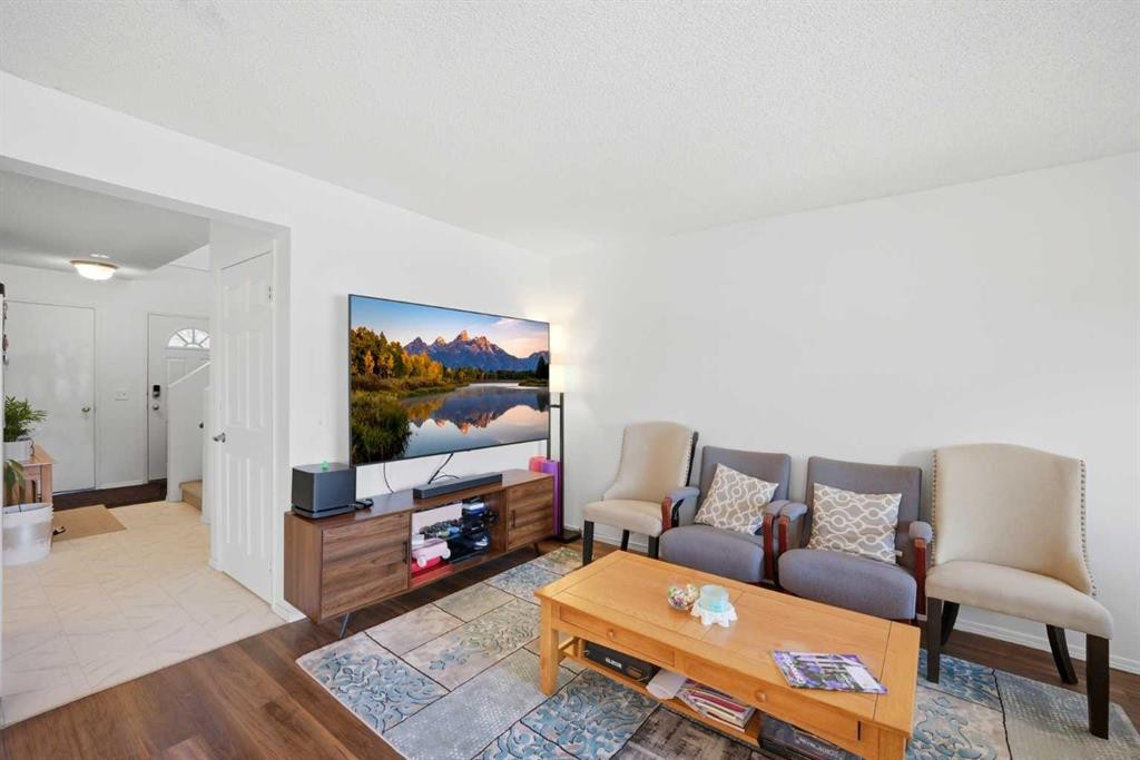 80 Martinglen Way Ne, Calgary, AB - Indoor Photo Showing Living Room