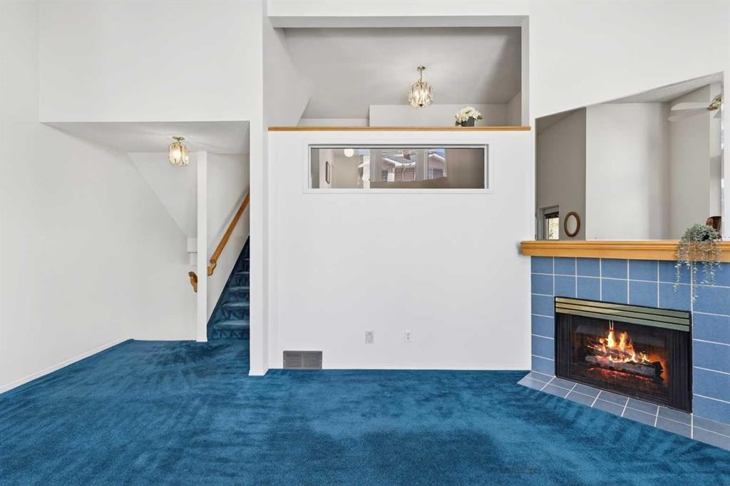 404 Hawkstone Manor Nw, Calgary, AB - Indoor With Fireplace
