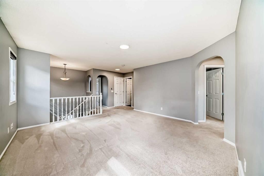 46 Saddlecrest Gardens Ne, Calgary, AB - Indoor Photo Showing Other Room